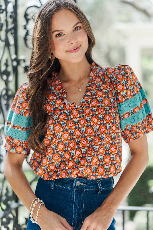 women's tops for those who love to mix and match prints and patternsJust Right Orange Medallion Blouse