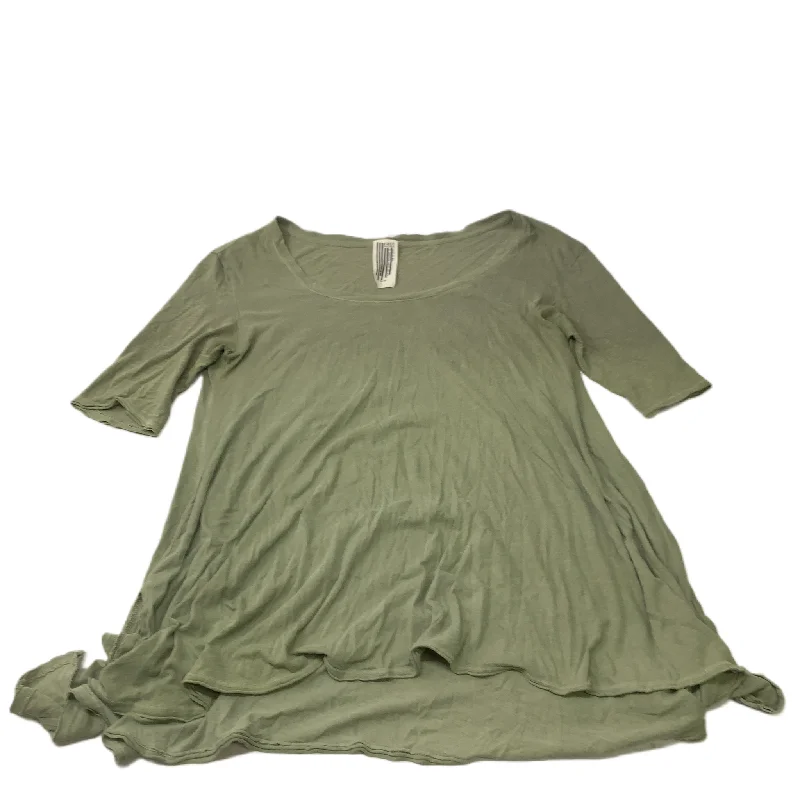 women's tops for those who want to add a touch of elegance and sophistication to their everyday wearGreen  Tunic Short Sleeve By Free People  Size: S